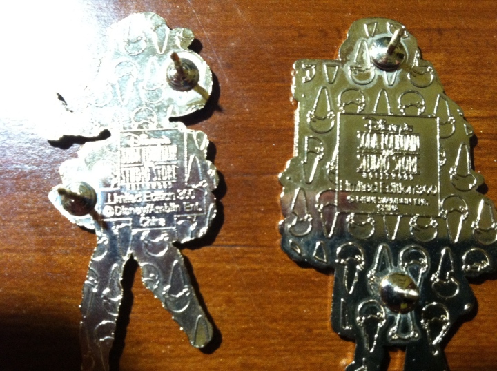 On the left, a fake pin and on the right a genuine one. Notice the differences?