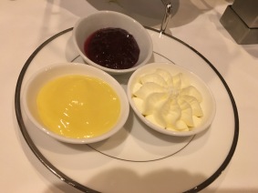 A wonderful trio of flavors to go with your scones - Lemon Curd, Devonshire Cream, and I believe it was a raspberry jam