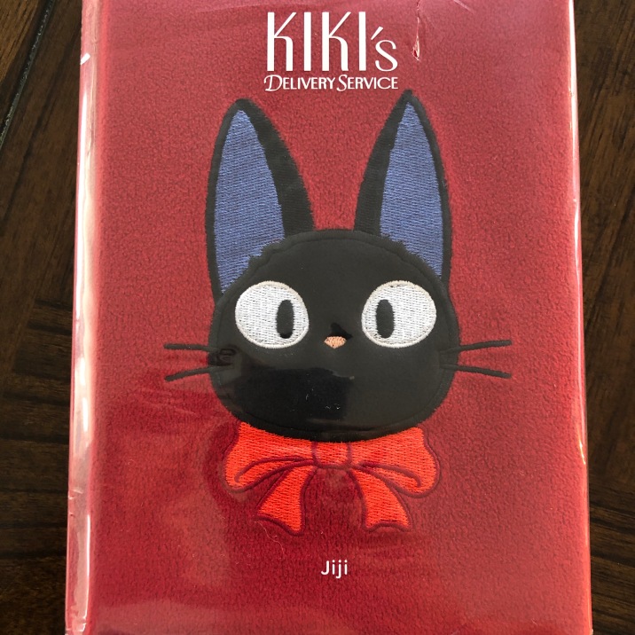 The Jiji Plush Journal is soft but not too soft. It's still definitely a book and easily goes on your shelf